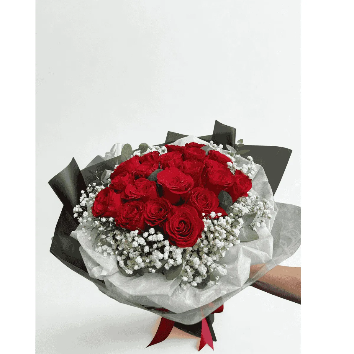 Romantic Valentine's Day bouquet with red roses and elegant arrangement